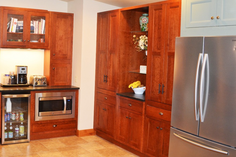 We put together a beautiful beverage center and pantry area to finish off the run of cabinetry.